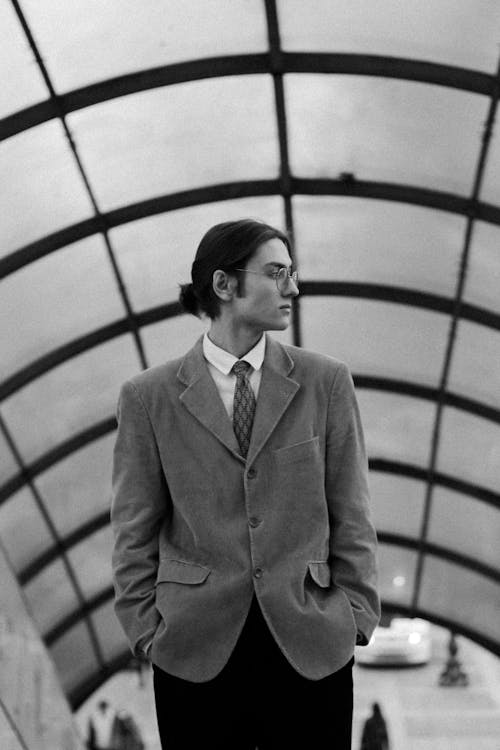 Elegant Man in Metro Station in Black and White 