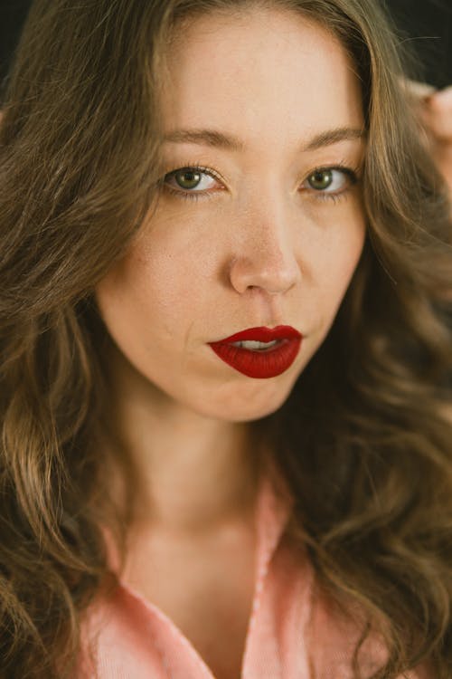 Portrait of a Woman with Intense Red Lipstick
