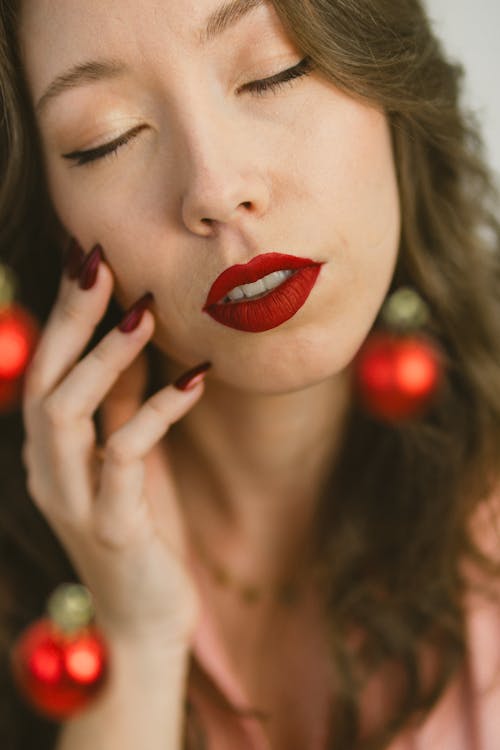 Portrait of a Pretty Brunette with Closed Eyes