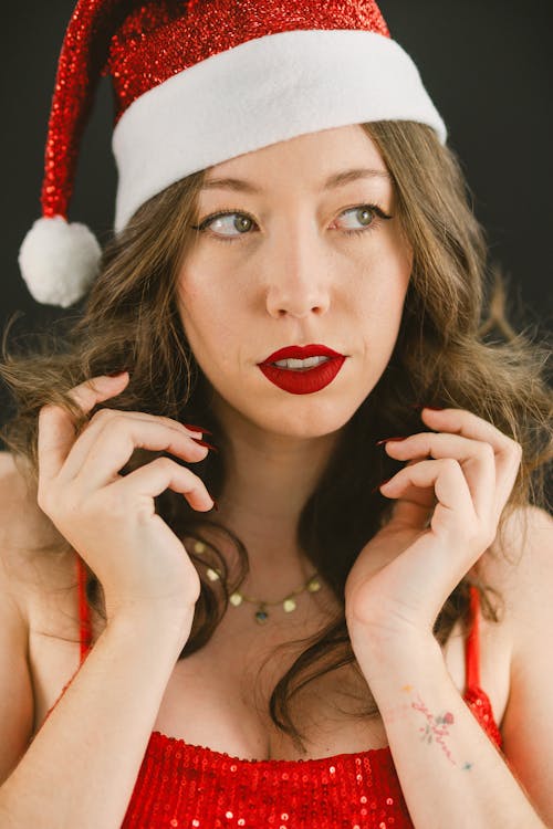 Woman Wearing a Santa Hat