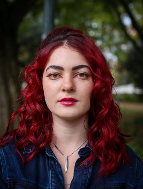 Portrait of a Young Woman with Long Dyed Hair