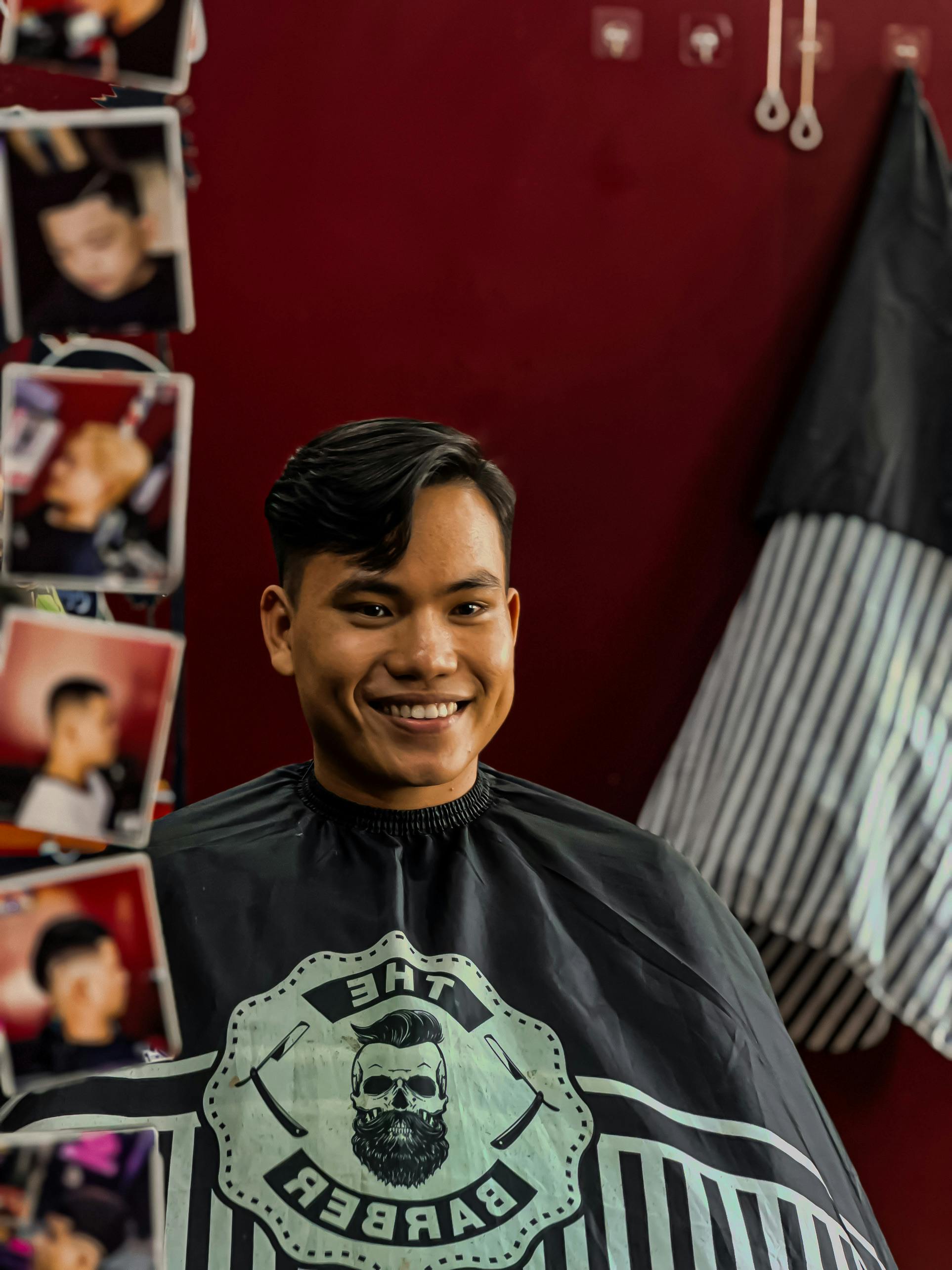 Smiling Brunette Man Sitting at Hairdresser