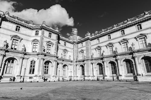 Decorated with sculptures facade of the Louvre Museum 