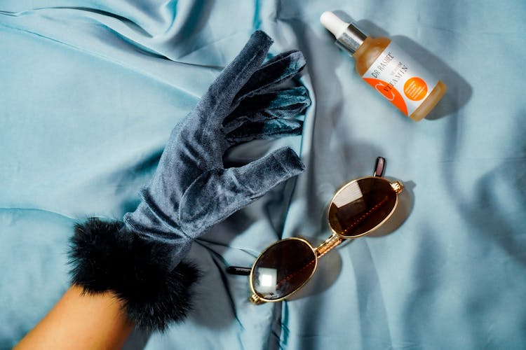 Hand In Glove By Sunglasses And Vitamin C Serum