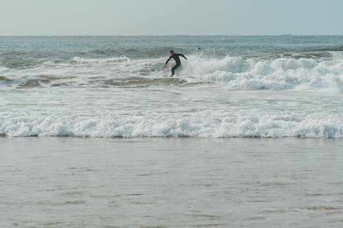 Surfer on Ocean Wave