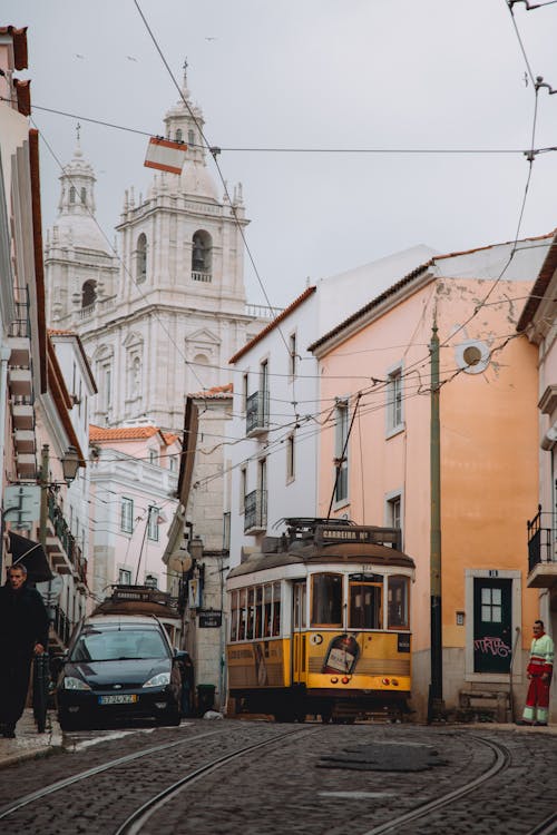 Lisbons Tram 28 with the Monastery of Sao Vicente de Fora in the Background