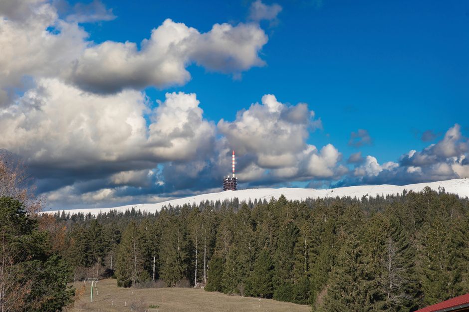 Modern mobile network tower providing 4G and 5G coverage across a scenic Slovakian landscape