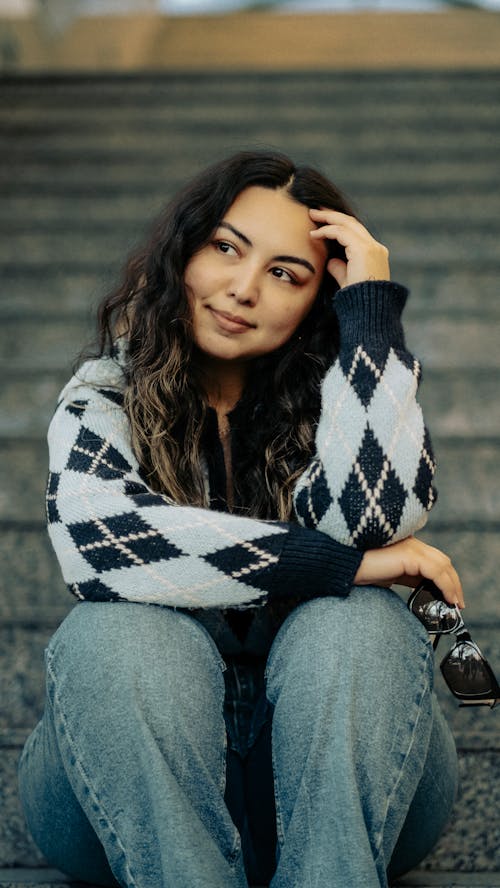 Smiling Brunette in Sweater and Jeans