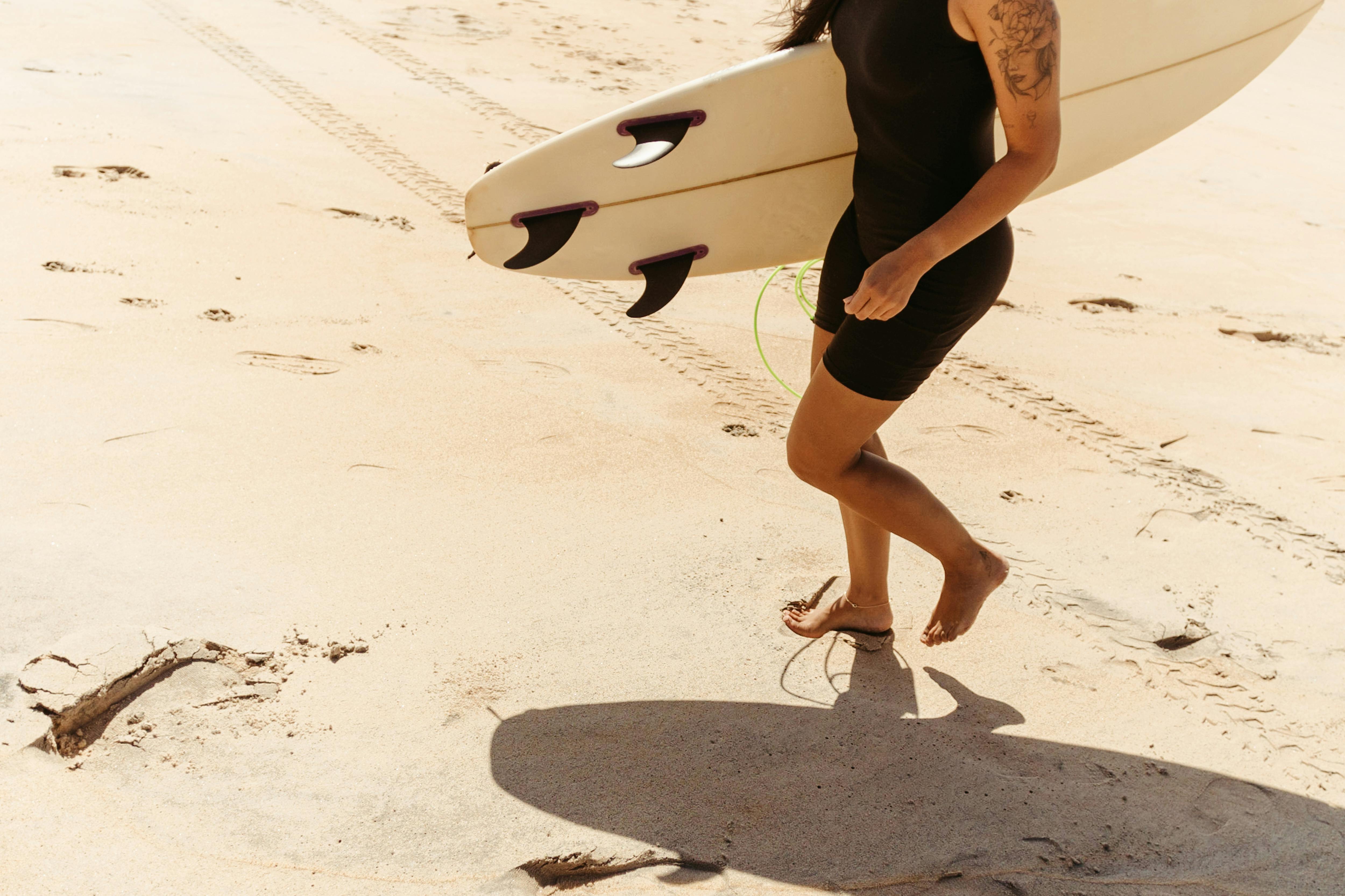 Woman in Black 2-piece Swimsuit Holding White and Red Surfboard · Free ...