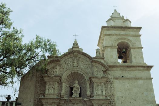 A church with a bell tower and a clock
