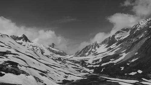 rocky mountain with snow