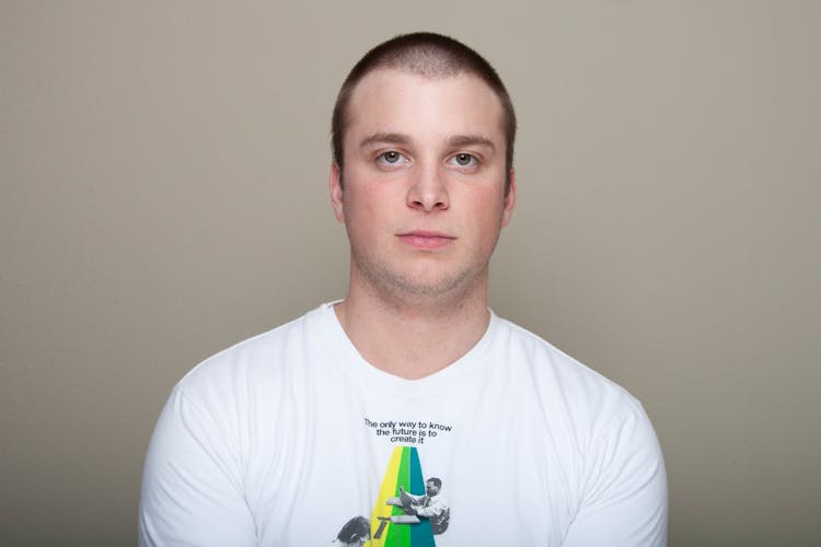 Portrait Of Man Wearing White T-Shirt 