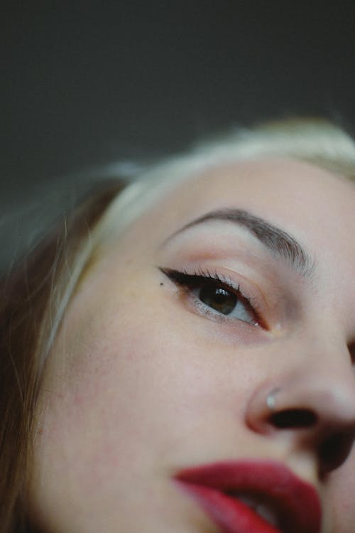 Blonde with Nose Ring Wearing Makeup
