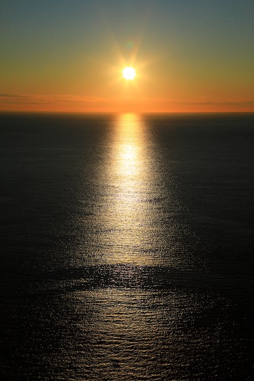 Sun Shining over Sea at Dawn