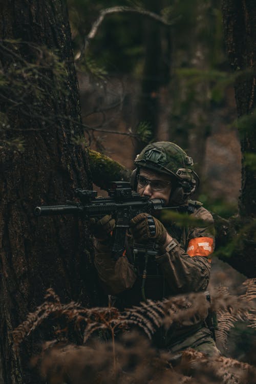Soldier with a Rifle in the Forest