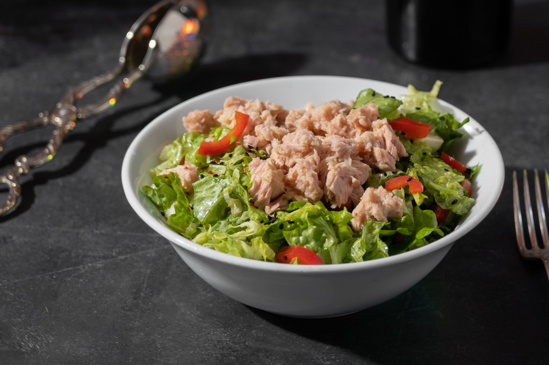 Close-up of Italian tuna salad with lemon and basil