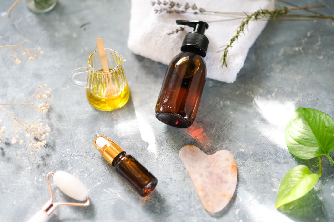 Natural skincare products and body care tools arranged together
