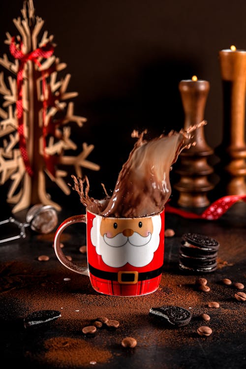 Free Hot Chocolate Spilling from Christmas Cup Stock Photo