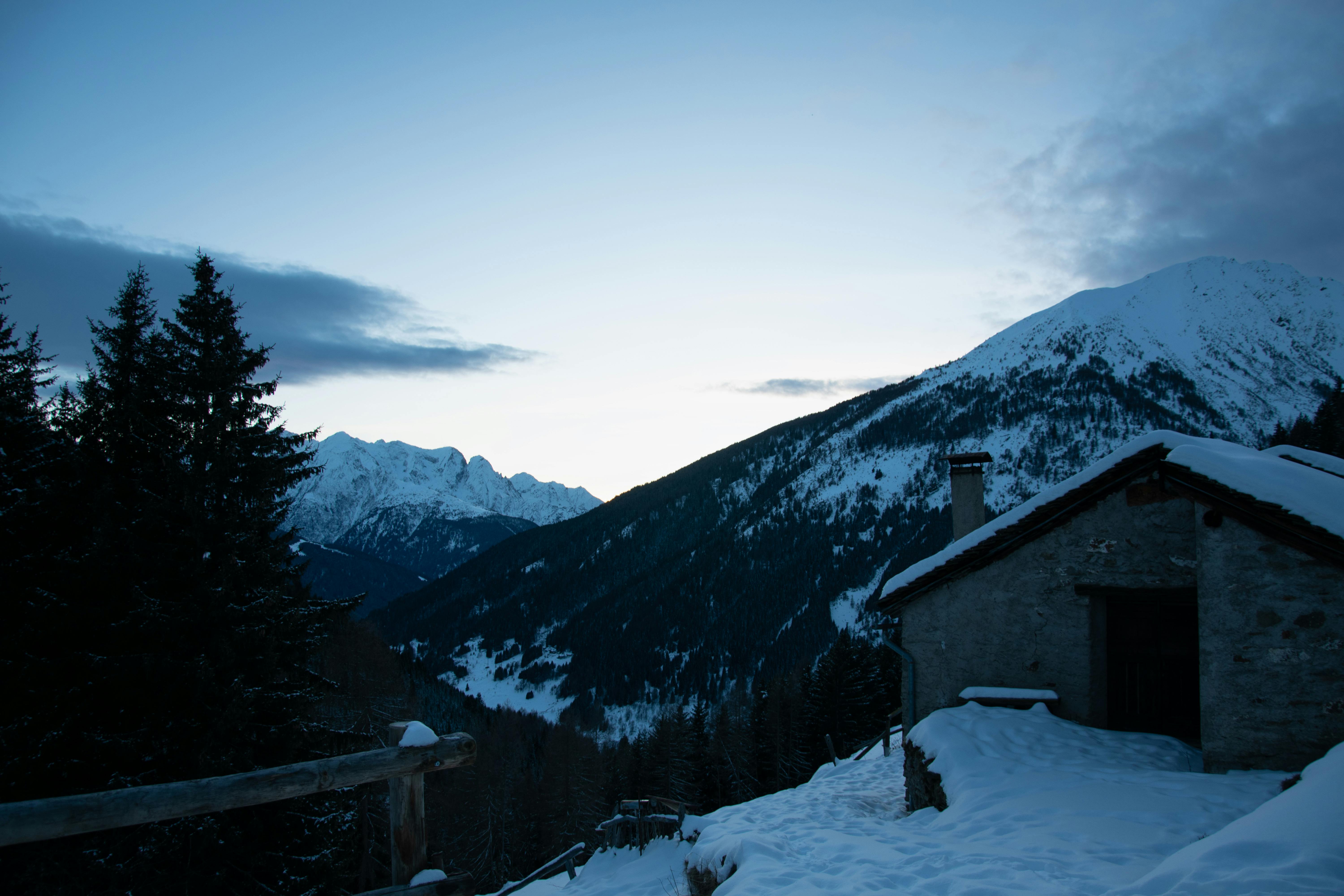 house on winter mountains landscape