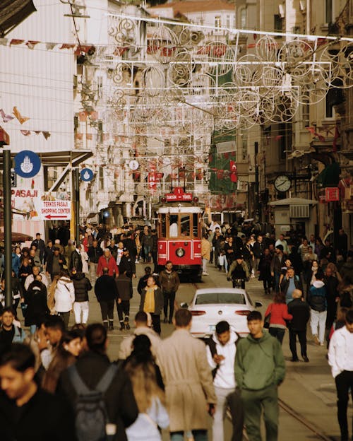 Tram in a Crowded City Street 