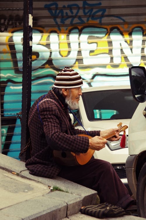 Street Musician Playing the Lute 