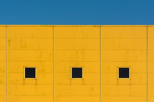 Yellow Building Wall with Windows