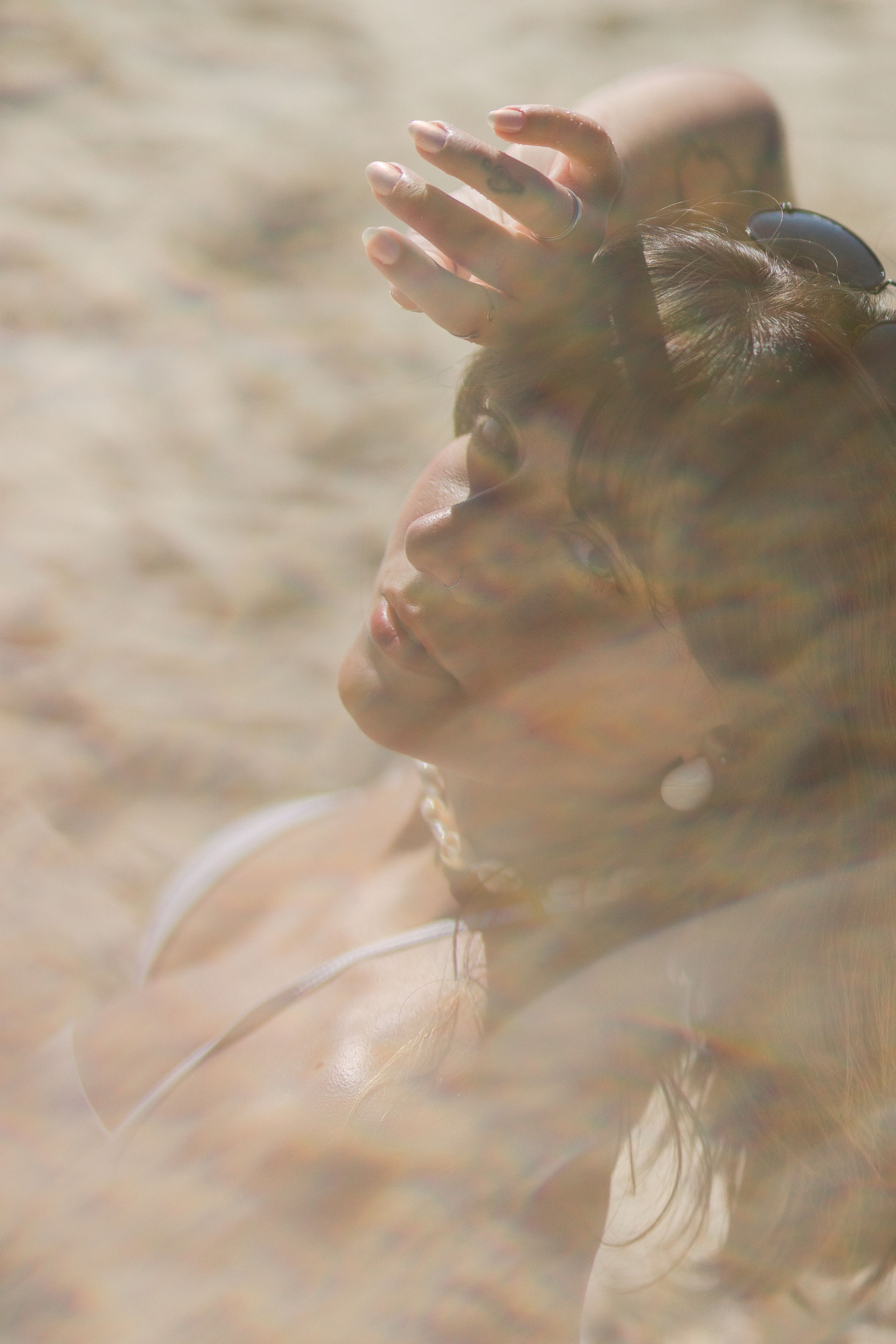 Woman in a Bikini Sitting on the Beach · Free Stock Photo