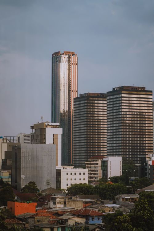 Free Urban landscape of Jakarta with modern high-rise buildings and city skyline. Stock Photo