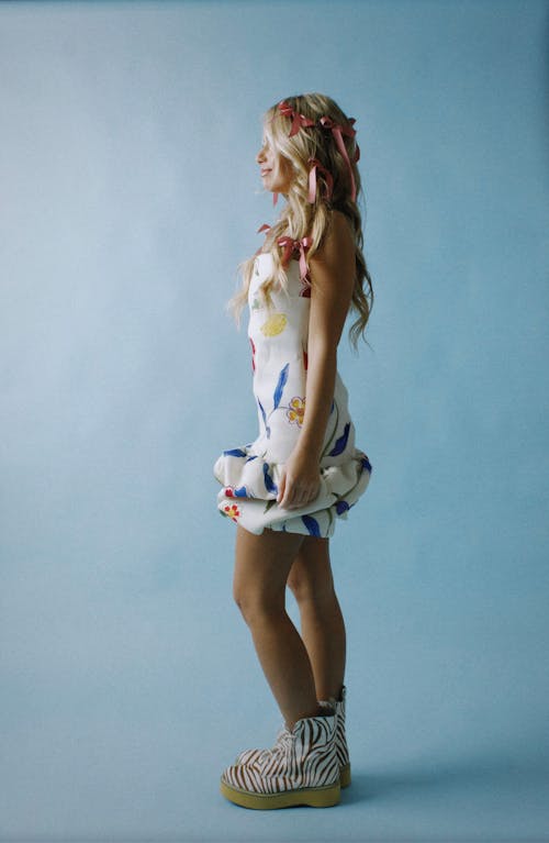 Blonde Woman Wearing Colorful Dress 