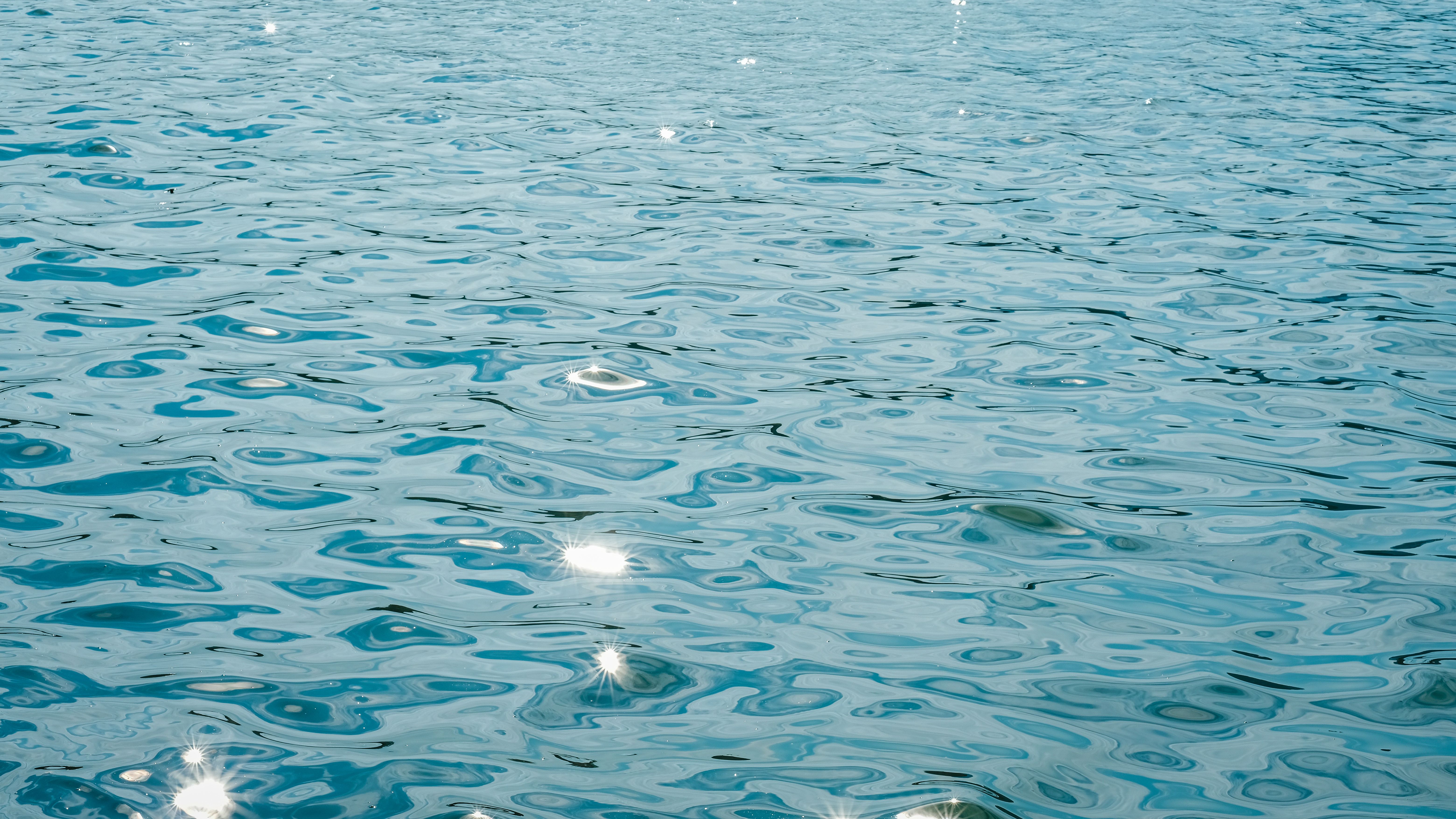 Close-up of Sun Reflecting in the Water Surface · Free Stock Photo