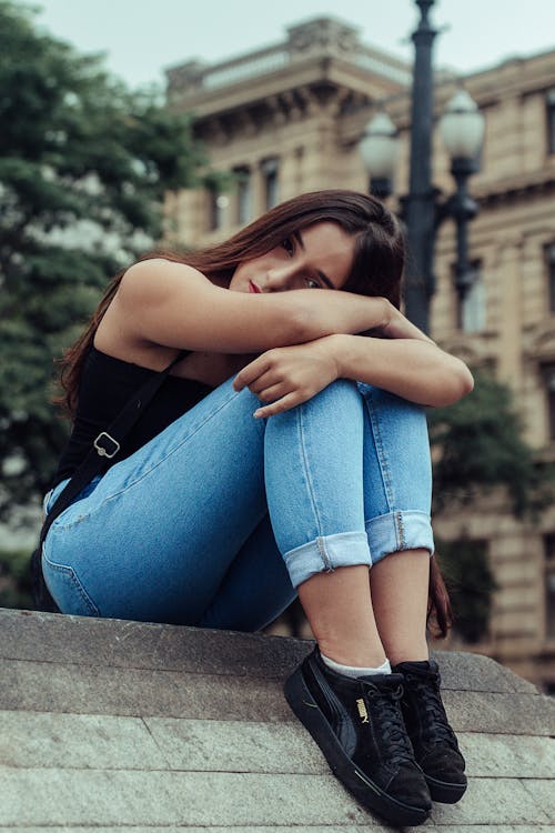 Woman Sitting On Floor