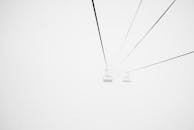 Black and White Image of Two Ski Lifts