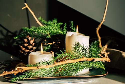 Christmas Decoration with Candles, Fir Branches and Pine Cones