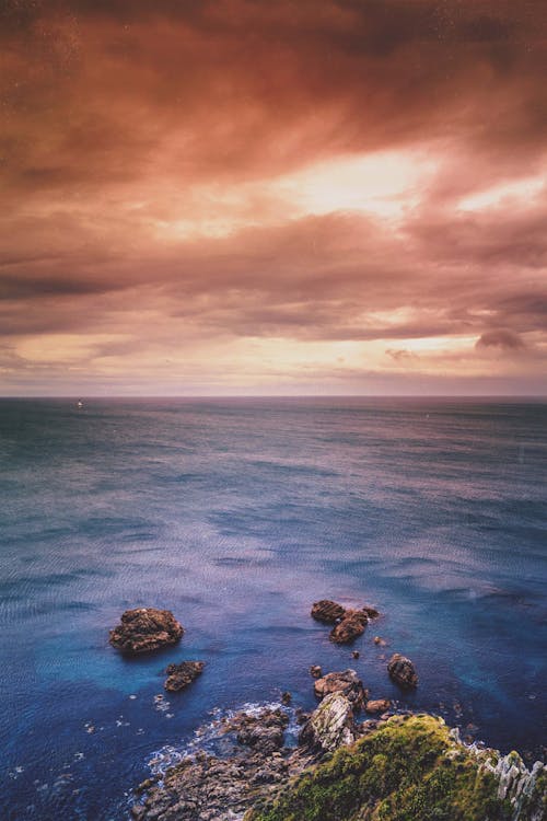 grátis Foto profissional grátis de água, beira-mar, céu Foto profissional