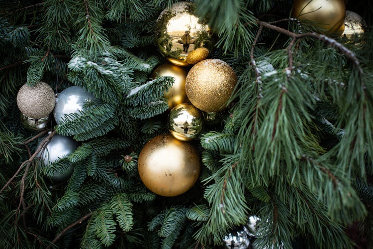 Golden Baubles On A Christmas Tree 