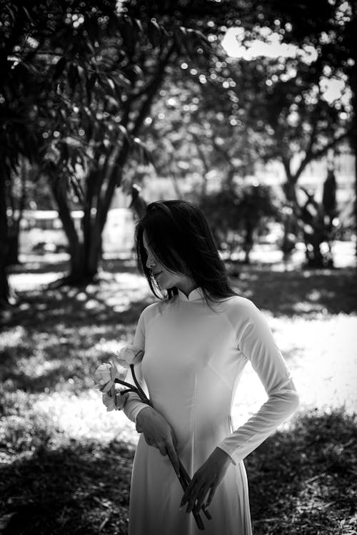 Woman Wearing White Dress in a Park in Black and White 
