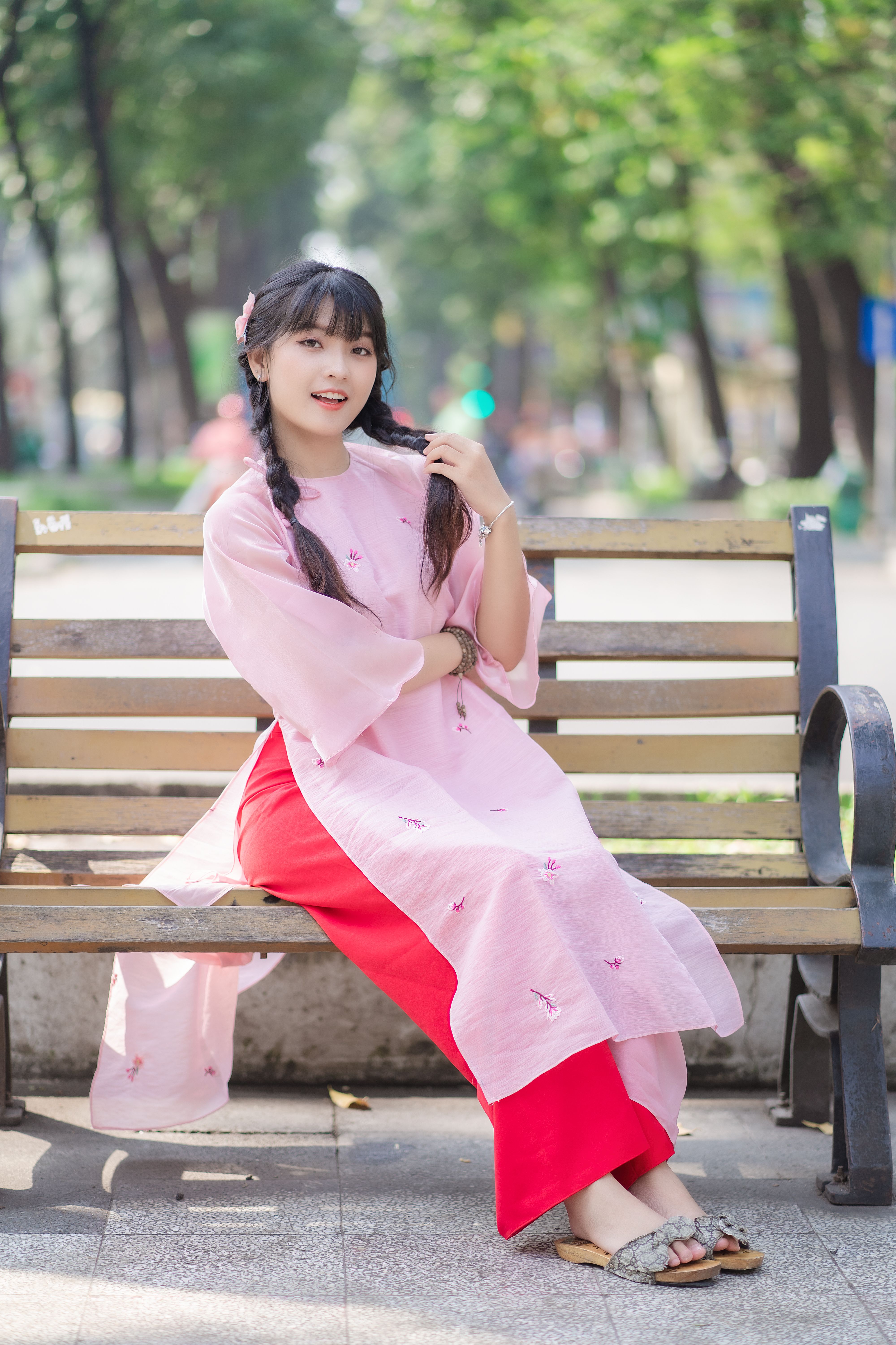 Young Brunette in Pink Dress · Free Stock Photo