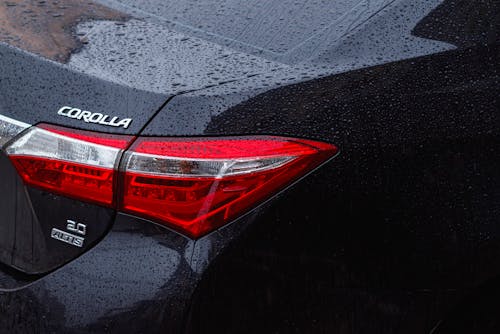 Raindrops on Black Toyota Corolla