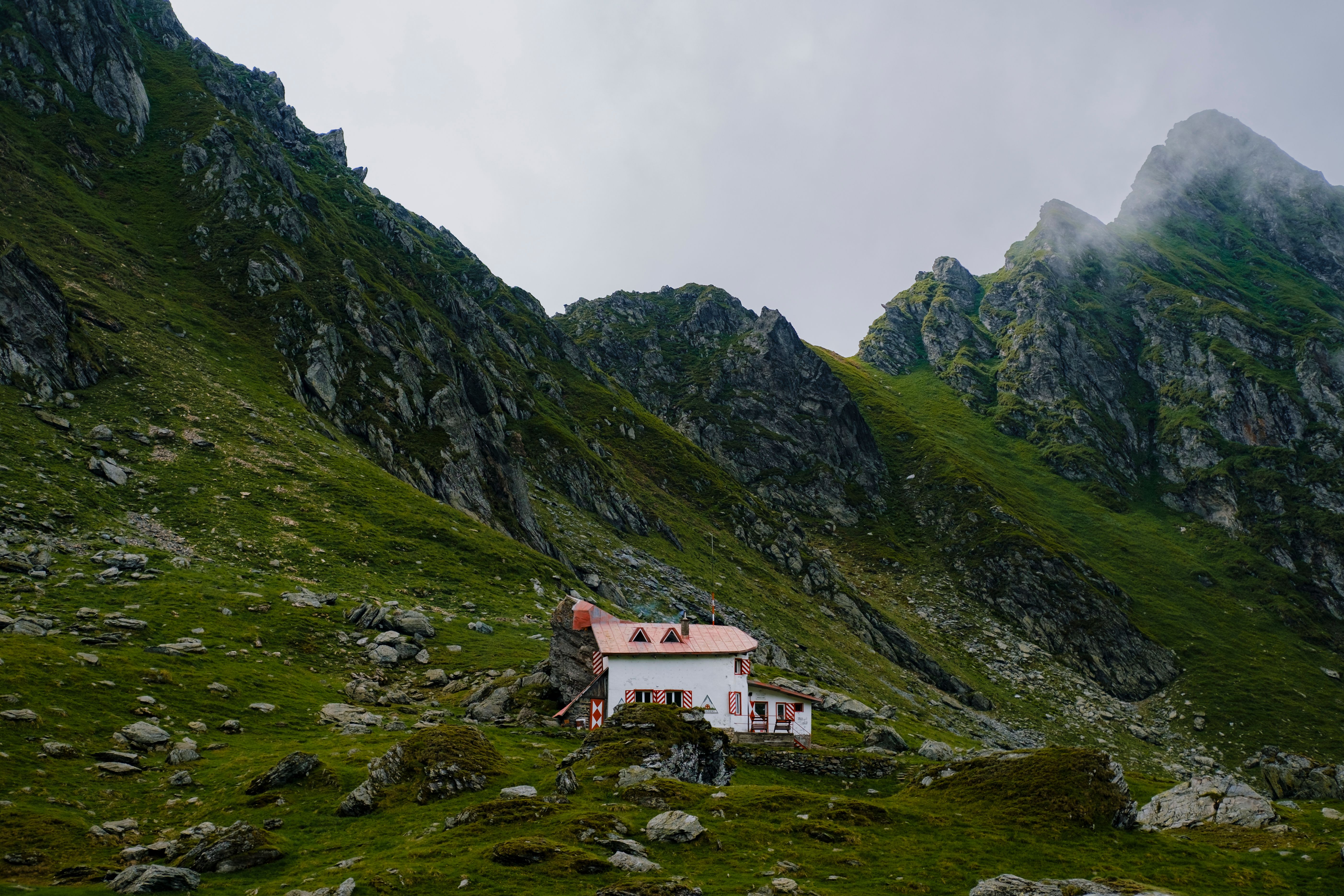 House in a Rocky Mountain Valley · Free Stock Photo