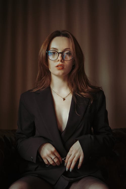 Woman in Black Suit and Eyeglasses