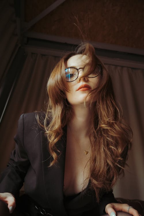 Woman with Brown Hair and in Eyeglasses