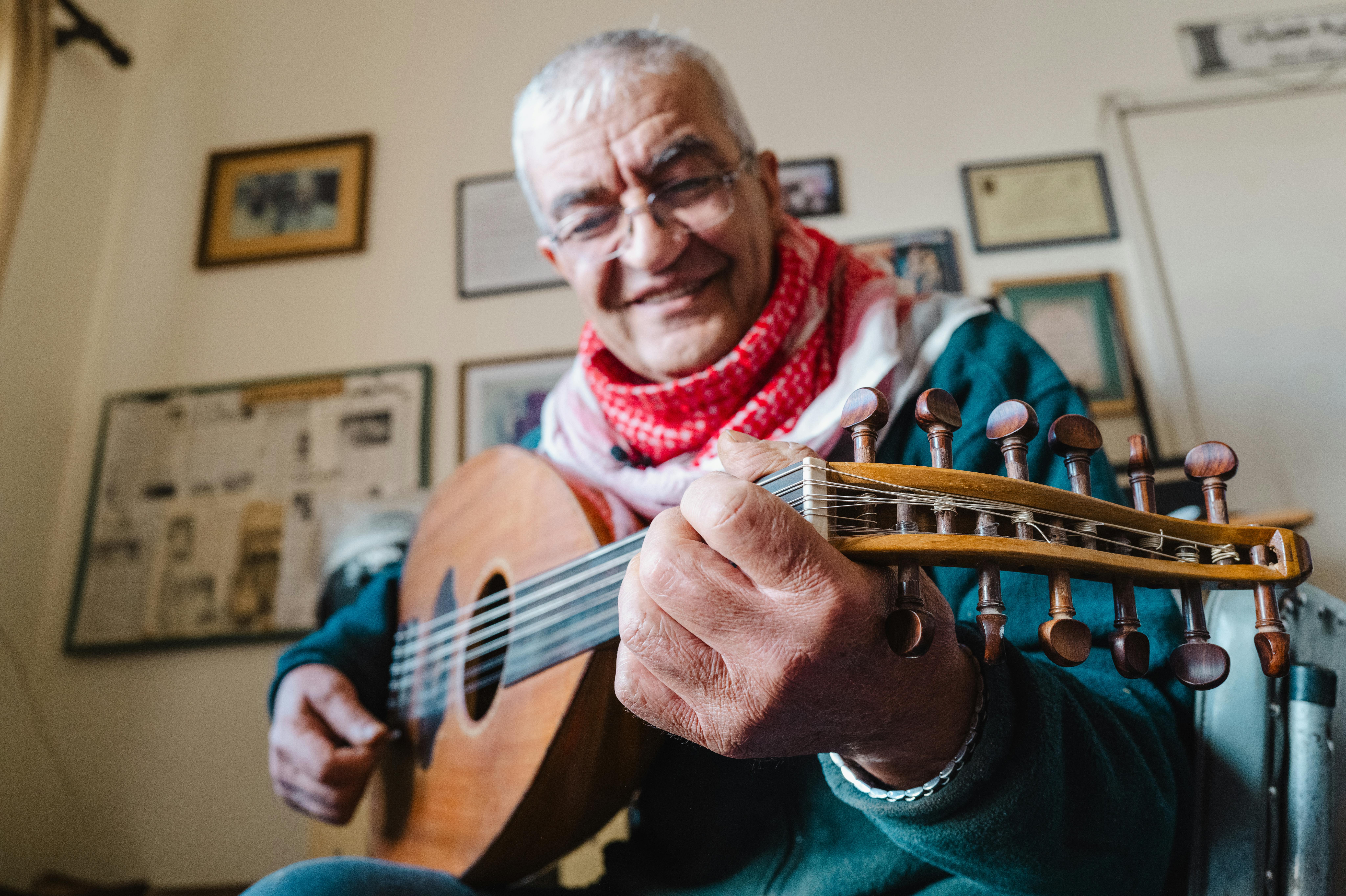 Palestinian Resilience Music - Man Playing Palestinian Musical Instrument Oud