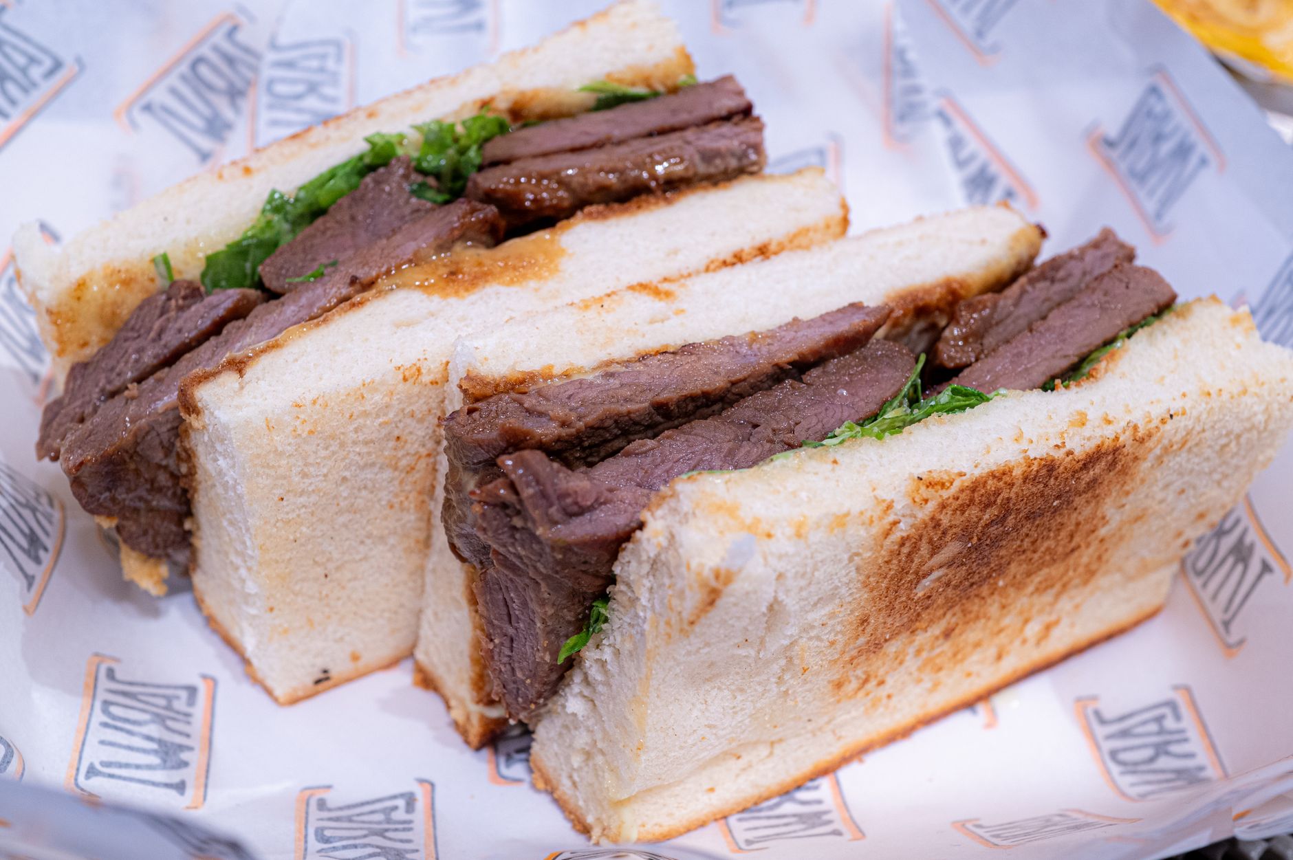 Close-up of artisan bread and fresh sandwich ingredients