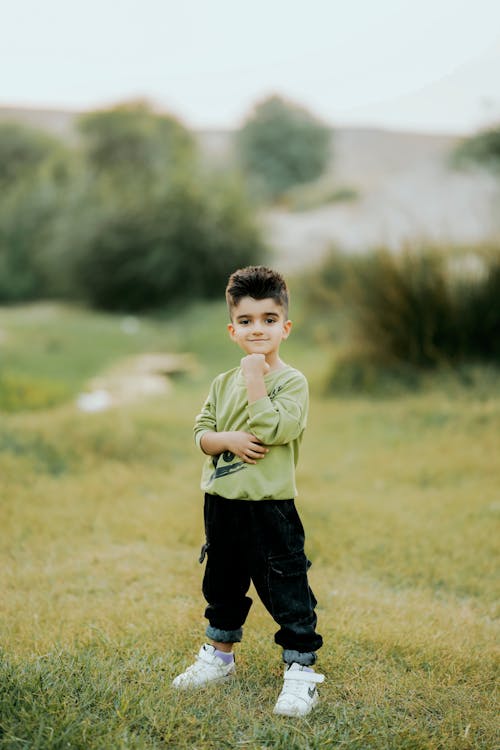 Little Boy on a Field