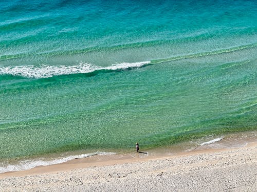 Foto profissional grátis de à beira-mar, areia, idílico