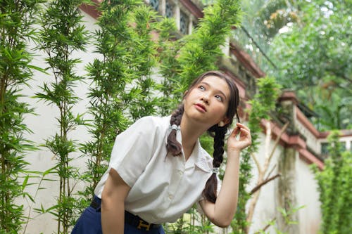 Woman in Garden Wearing Braids