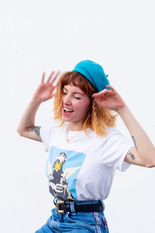 Women Wearing a Blue Hat Close-up Photography