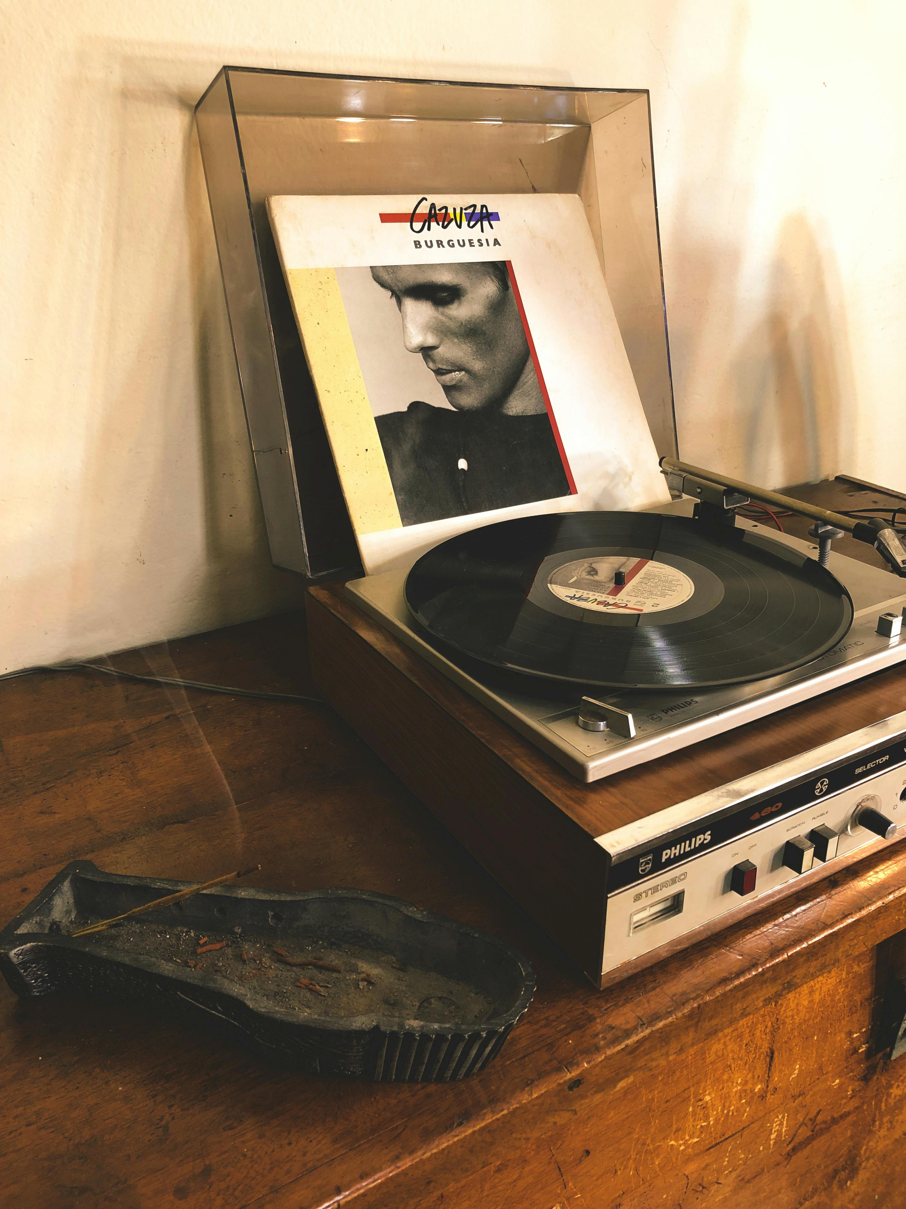 Vinyl Record in Vinyl Player on Table · Free Stock Photo