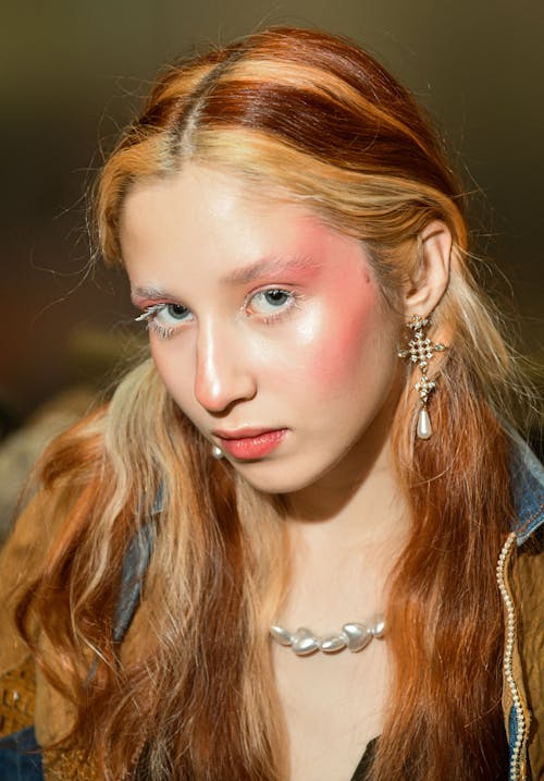 Portrait of Blonde Woman Wearing Makeup 