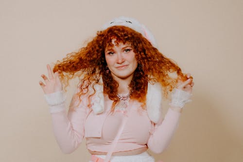 Portrait of a Young Woman Playing with her Hair 